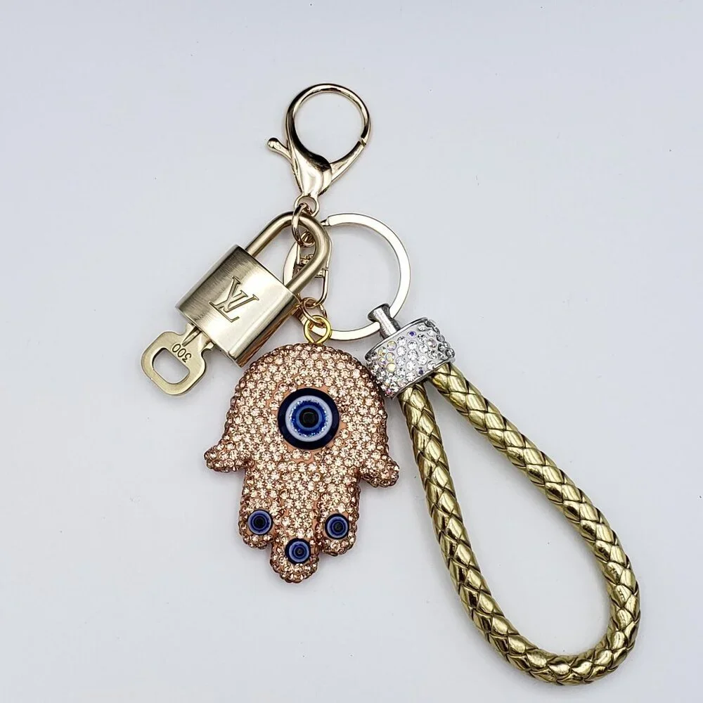 Authentic Louis Vuitton Lock & Key with unbranded Evil Eye Bagcharm 011526